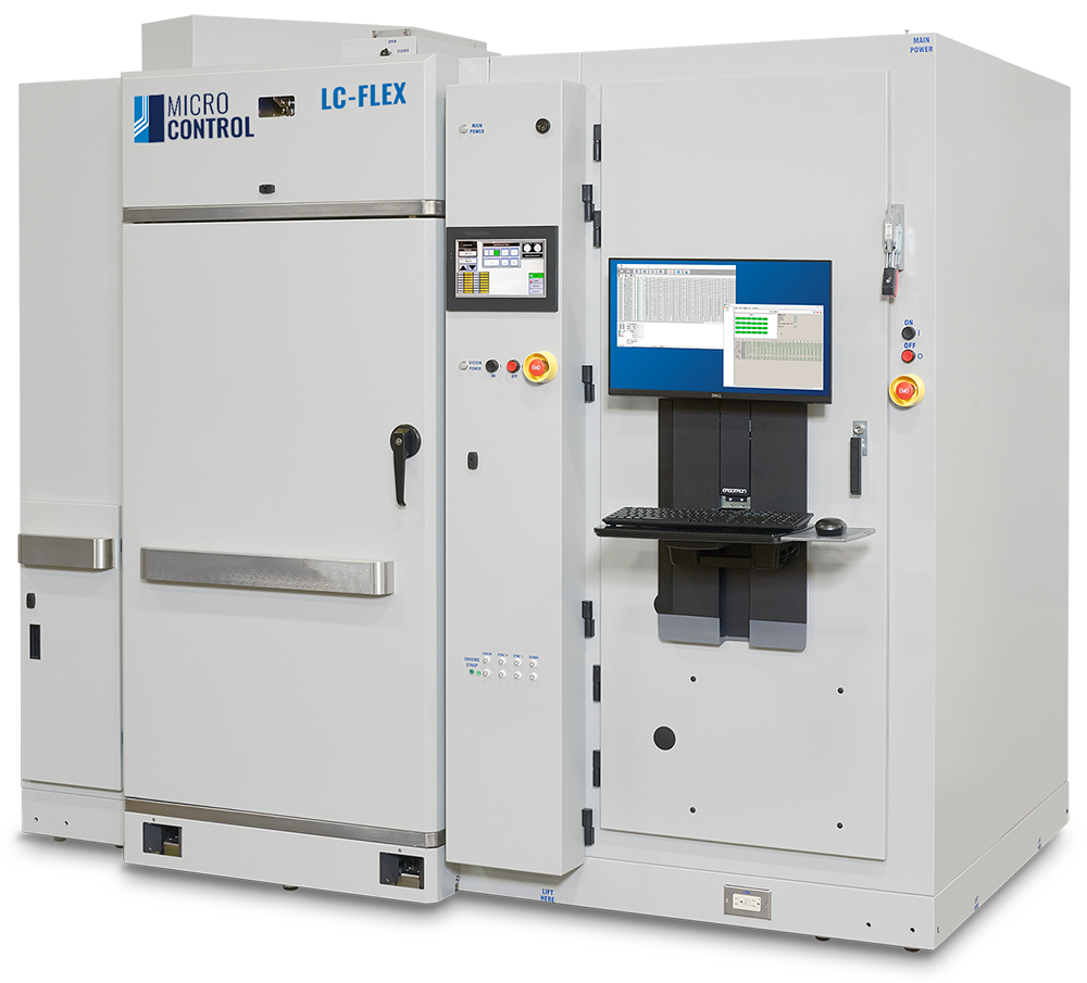 Micro Control LC-FLEX industrial test system with an integrated door, control panel, monitor, and keyboard.