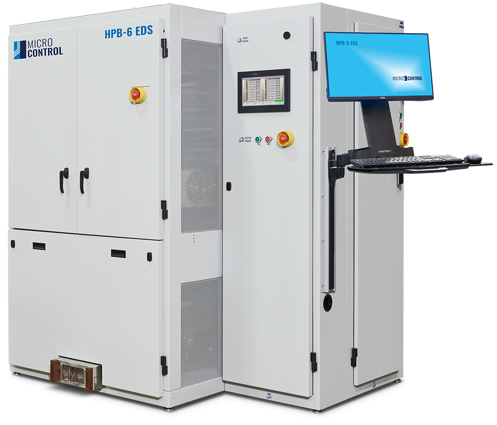 Micro Control HPB-6 EDS industrial testing equipment with a control panel and monitor workstation.