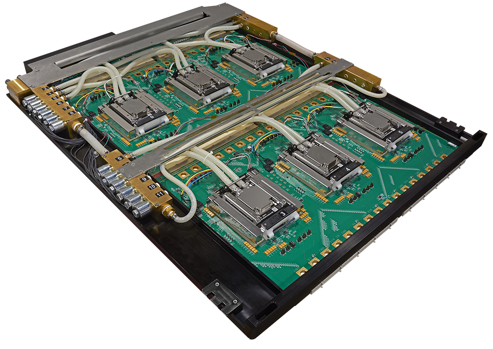 A high-performance computing server board with four processor sockets, integrated liquid cooling tubing, and numbered ports.