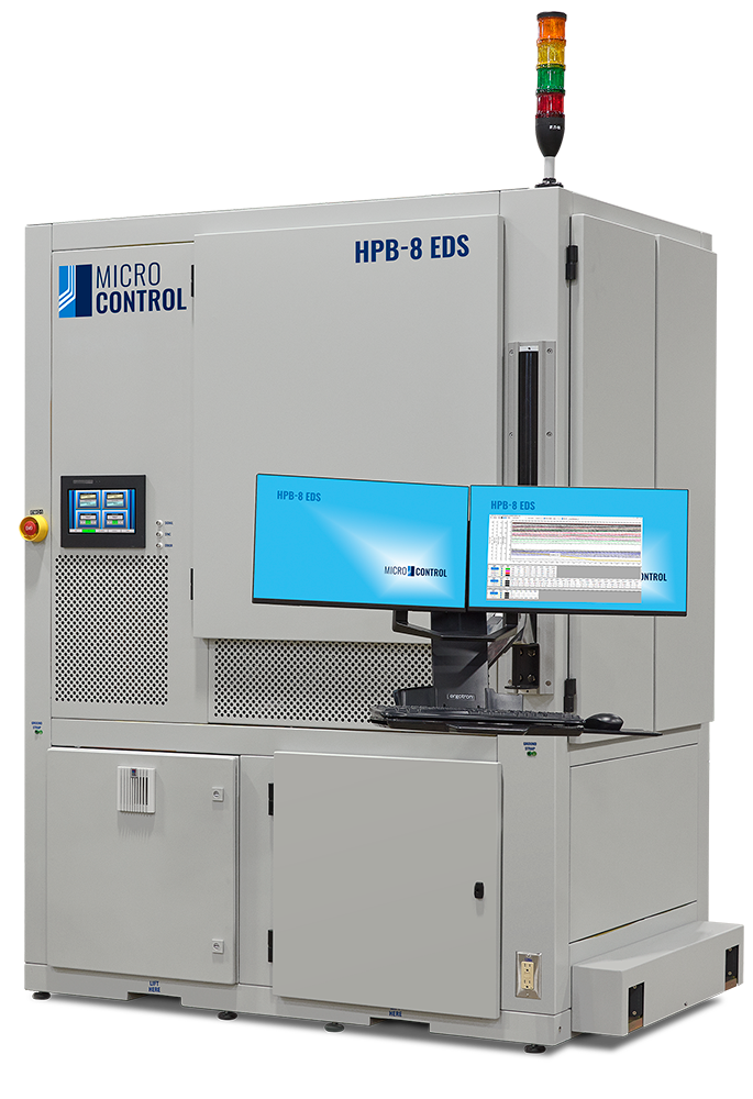Micro Control HPB-8 EDS industrial testing station with dual computer monitors, a keyboard, and a top-mounted status indicator light.