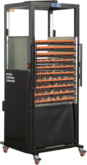 Micro Control Company industrial test equipment rack on wheels with multiple storage drawers.