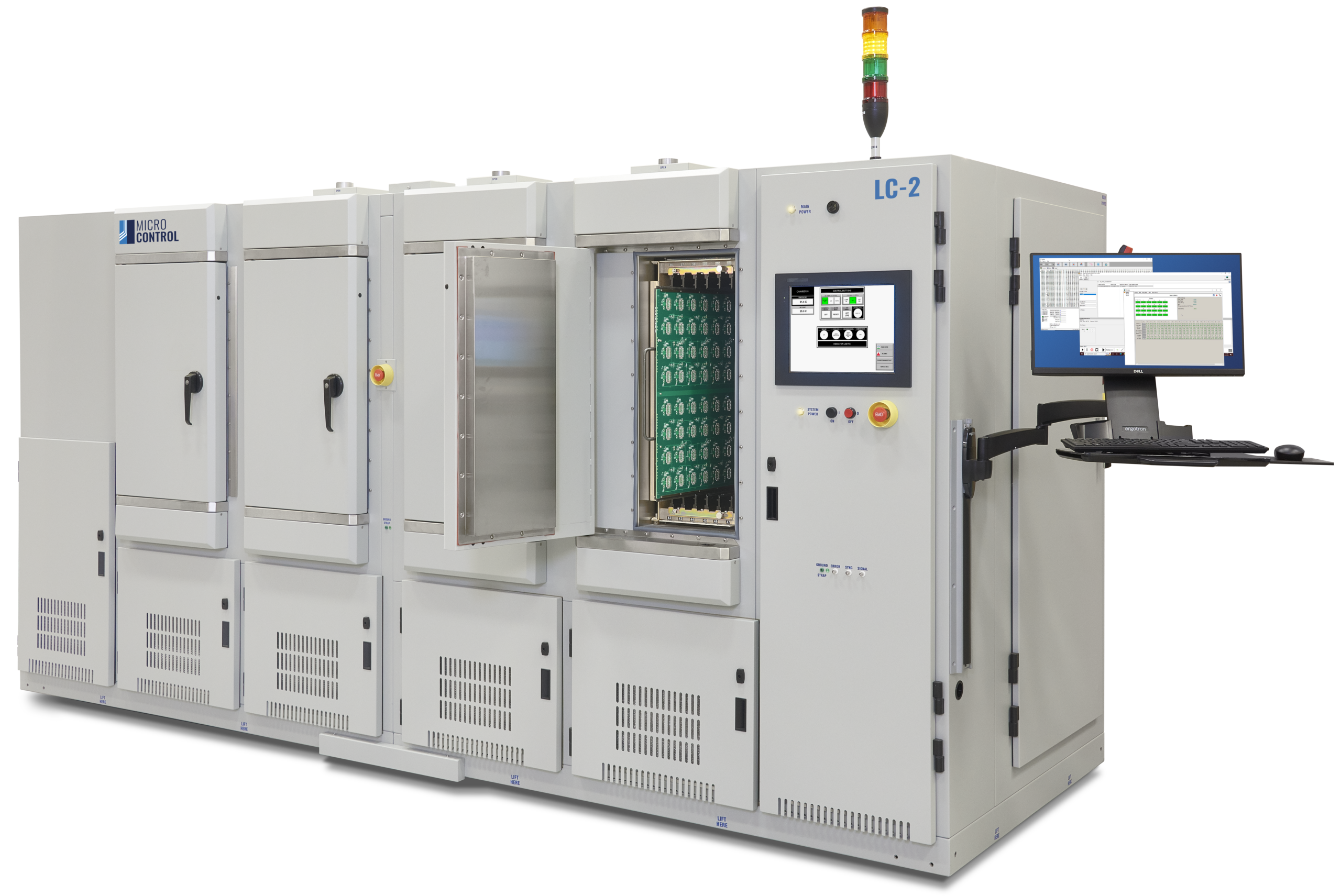 Micro Control LC-2 industrial testing system with an open chamber door displaying circuit boards, a touchscreen interface, and an attached computer workstation.
