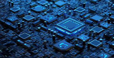 A close-up view of a computer circuit board with integrated circuit chips glowing with blue light.