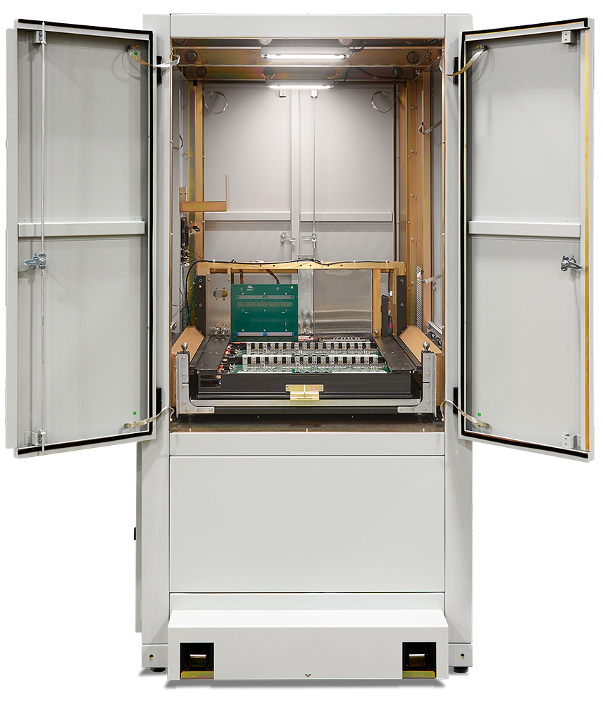 An industrial cabinet with open doors revealing internal electronic components and a circuit board.